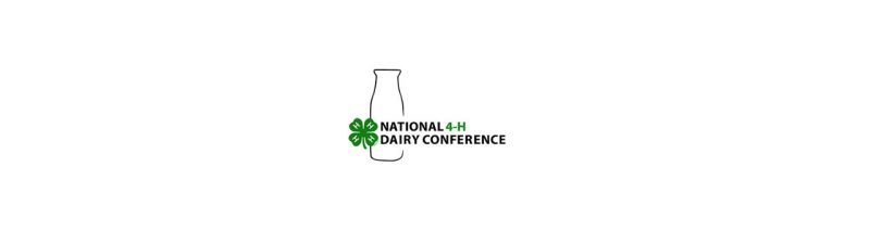 Old milk bottle behind 4-H emblem and "National 4-H Dairy Conferenence"